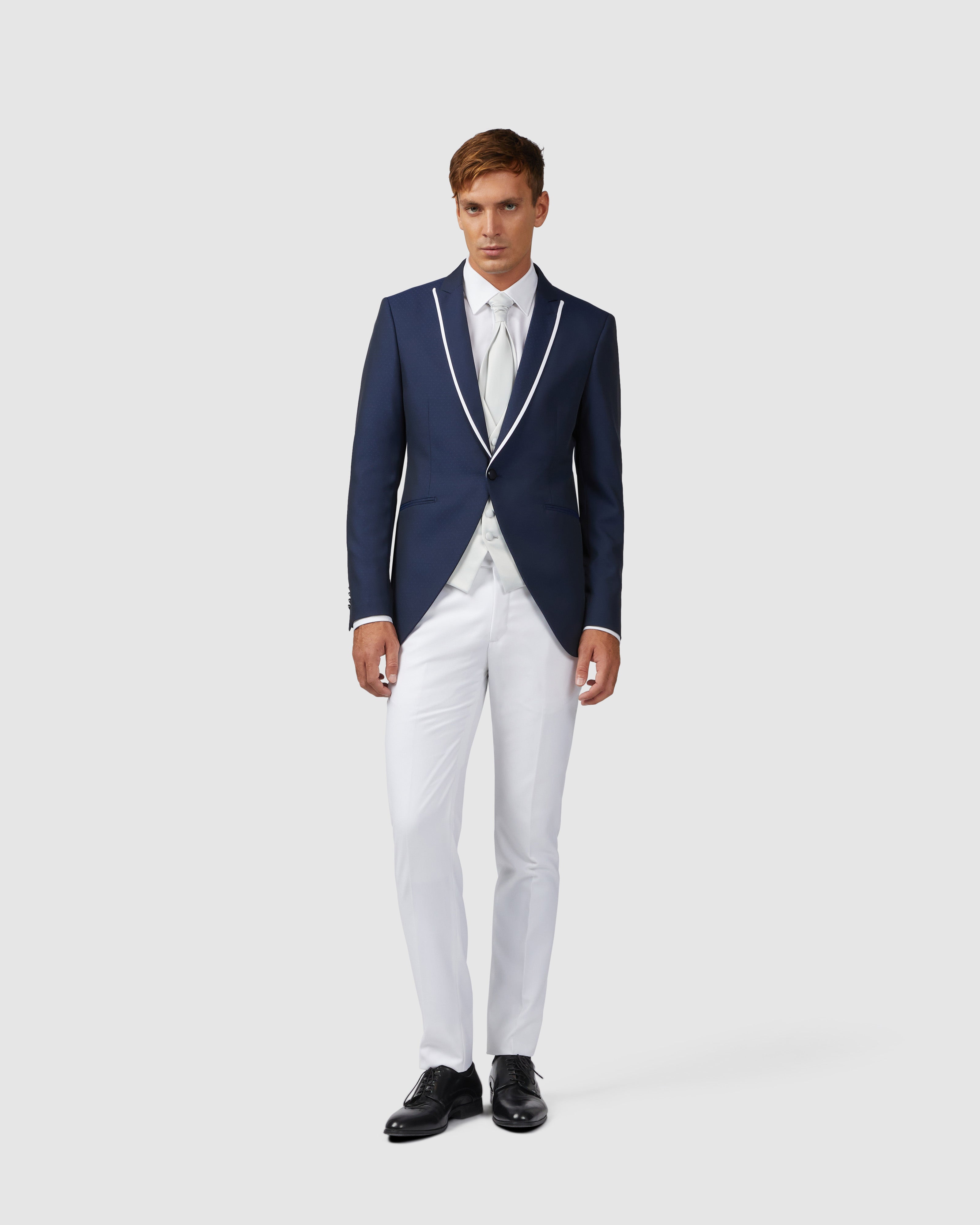 Traje 4 piezas azul con rever vivos contraste